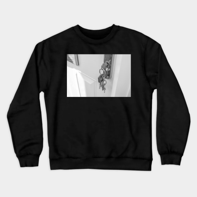 Keys on a key ring in the front door Crewneck Sweatshirt by yackers1